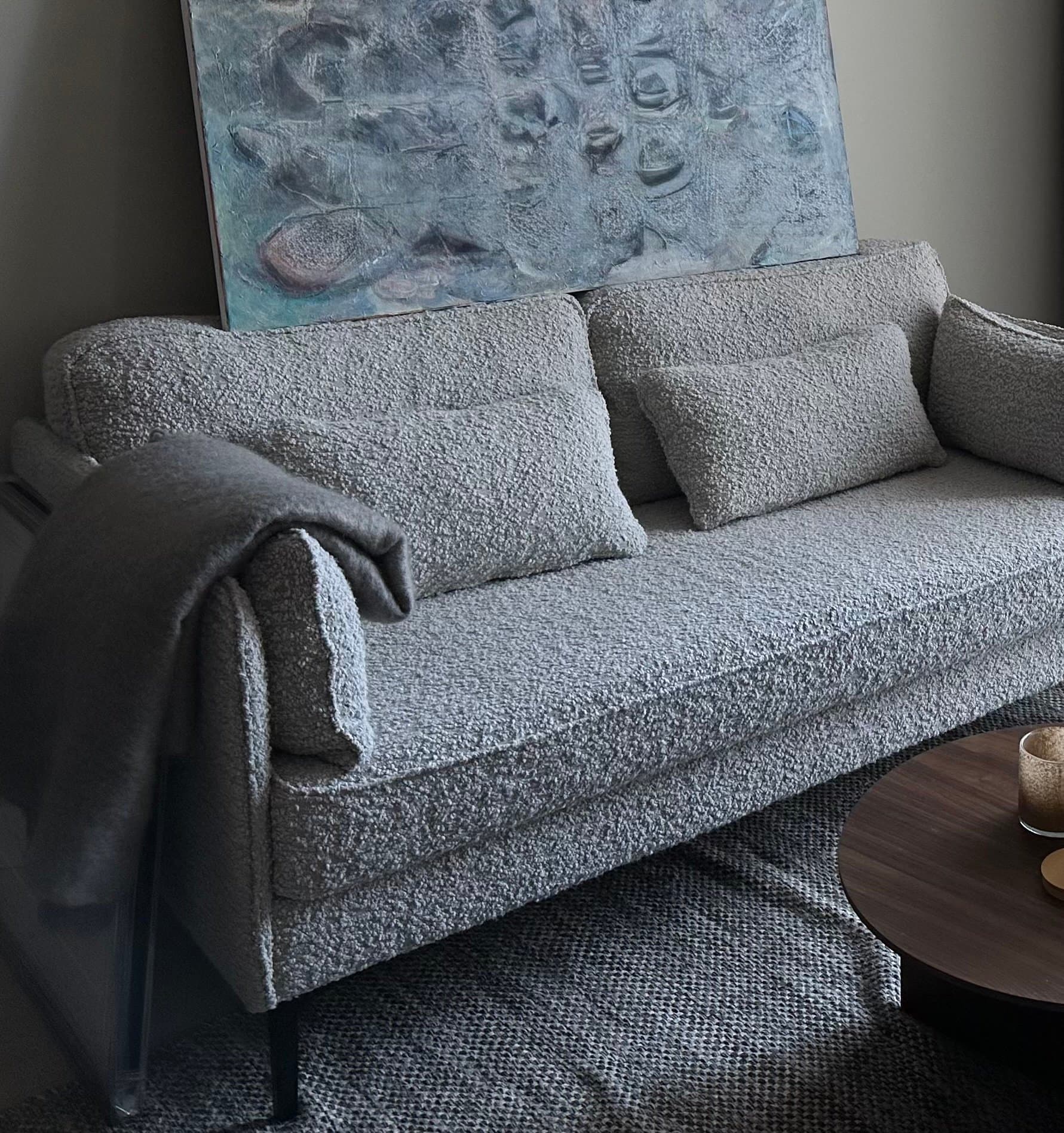 Soffa i bouclétyg
