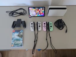 Nintendo Switch OLED med 4 Joy-Cons och spel