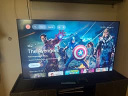 Sony PlayStation 5 Digital Edition med handkontroll och en tcl 55 tum 4k 120 Hz