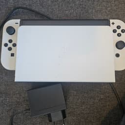 Nintendo Switch OLED med 3 spel