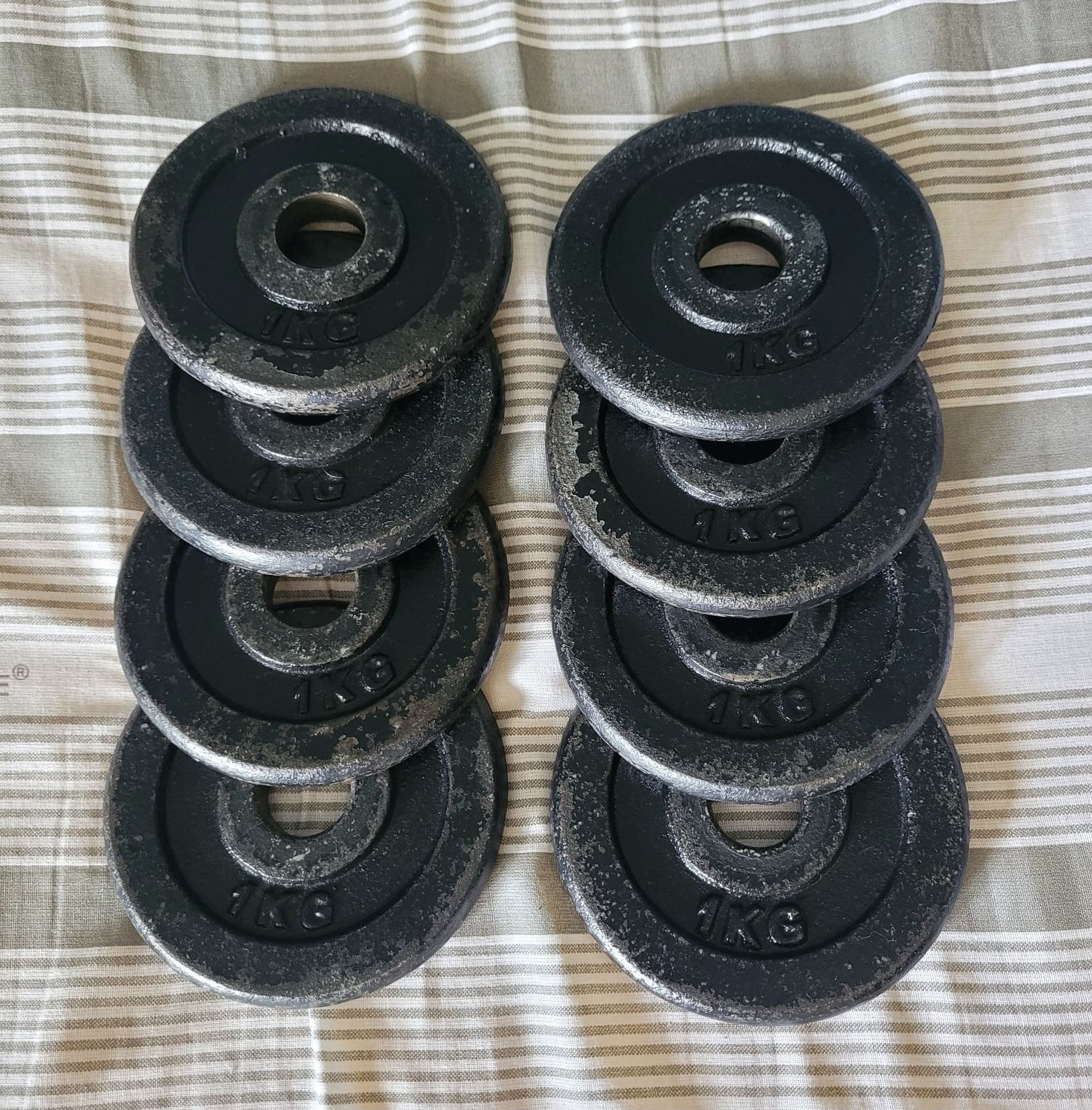 Viktskivor 1 kg, 8 stycken