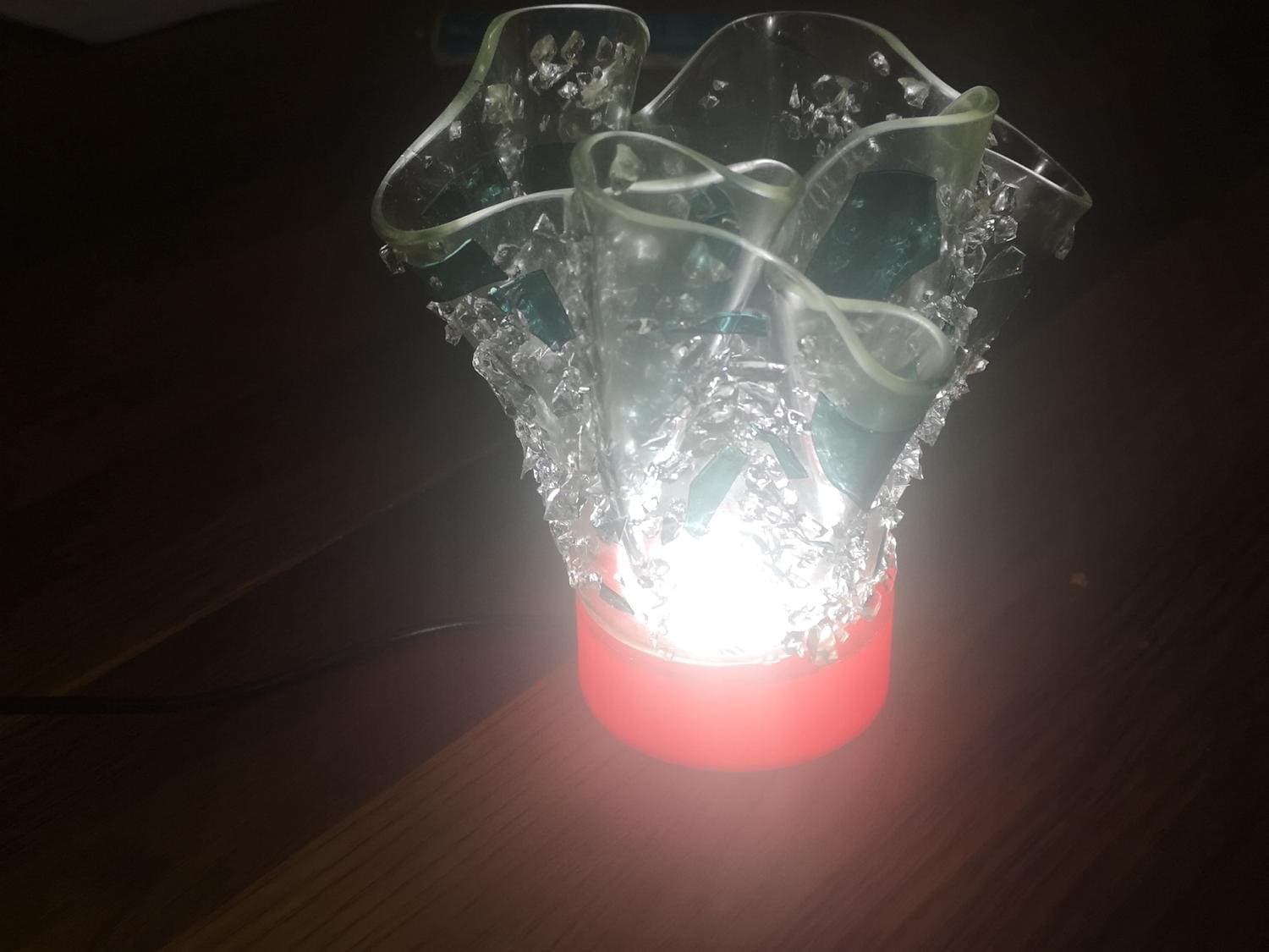 Underljus för konstglas röd
