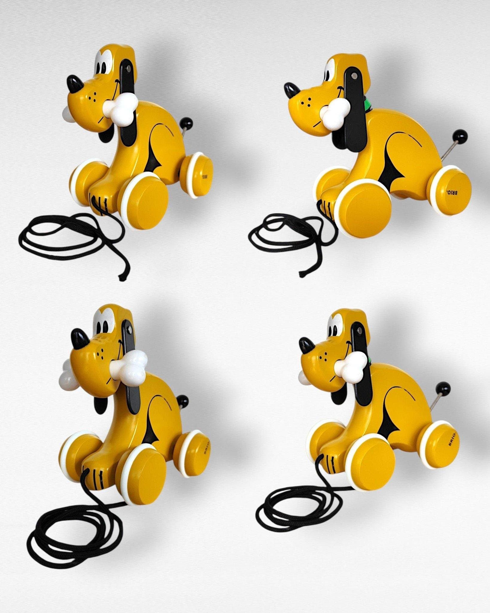 klassisk Brio-dragleksak föreställande Disney-figuren Pluto. Brio leksak hund