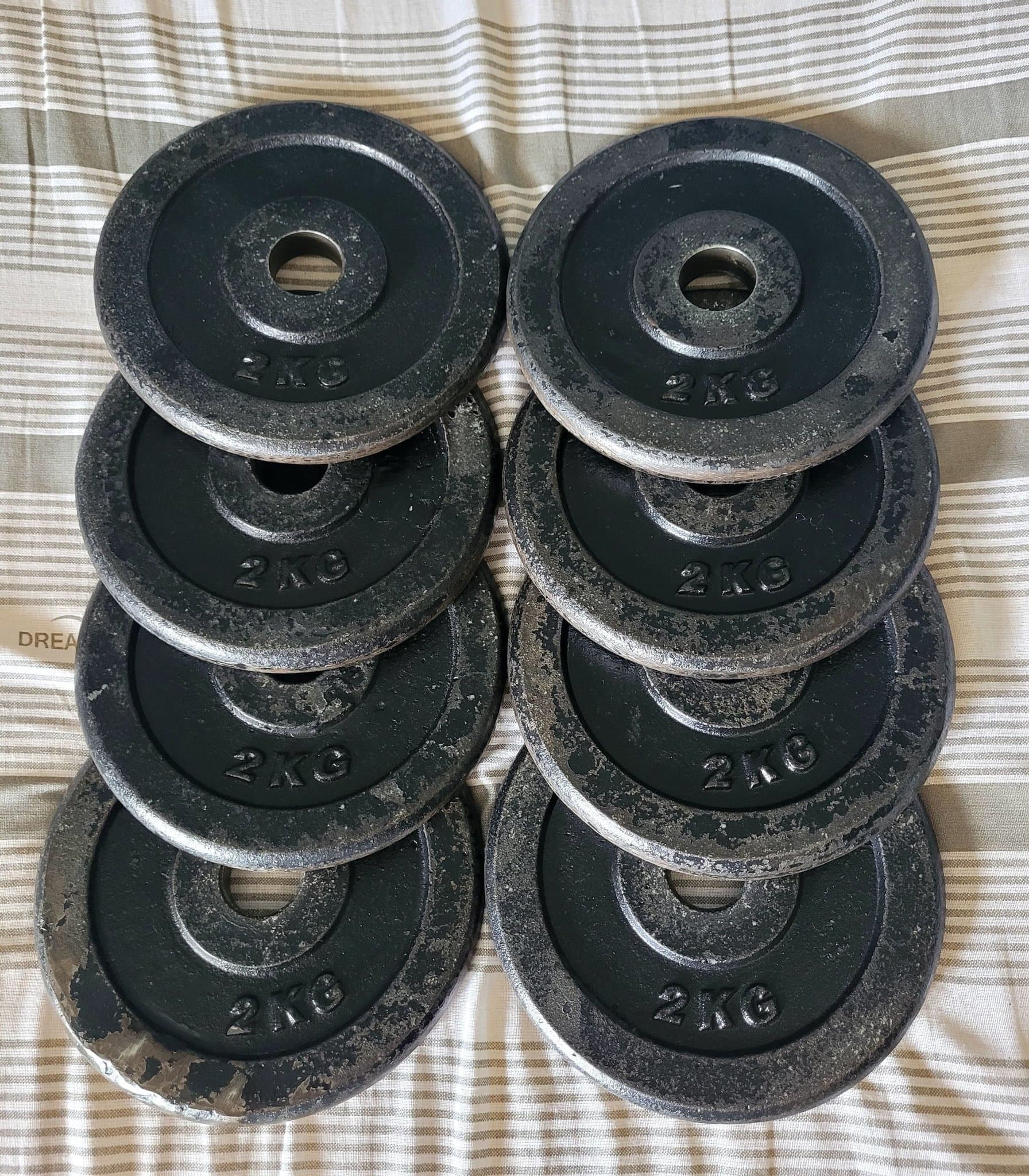 Viktskivor (hd 25mm) – totalvikt 101 kilo + 4 hantelstänger
