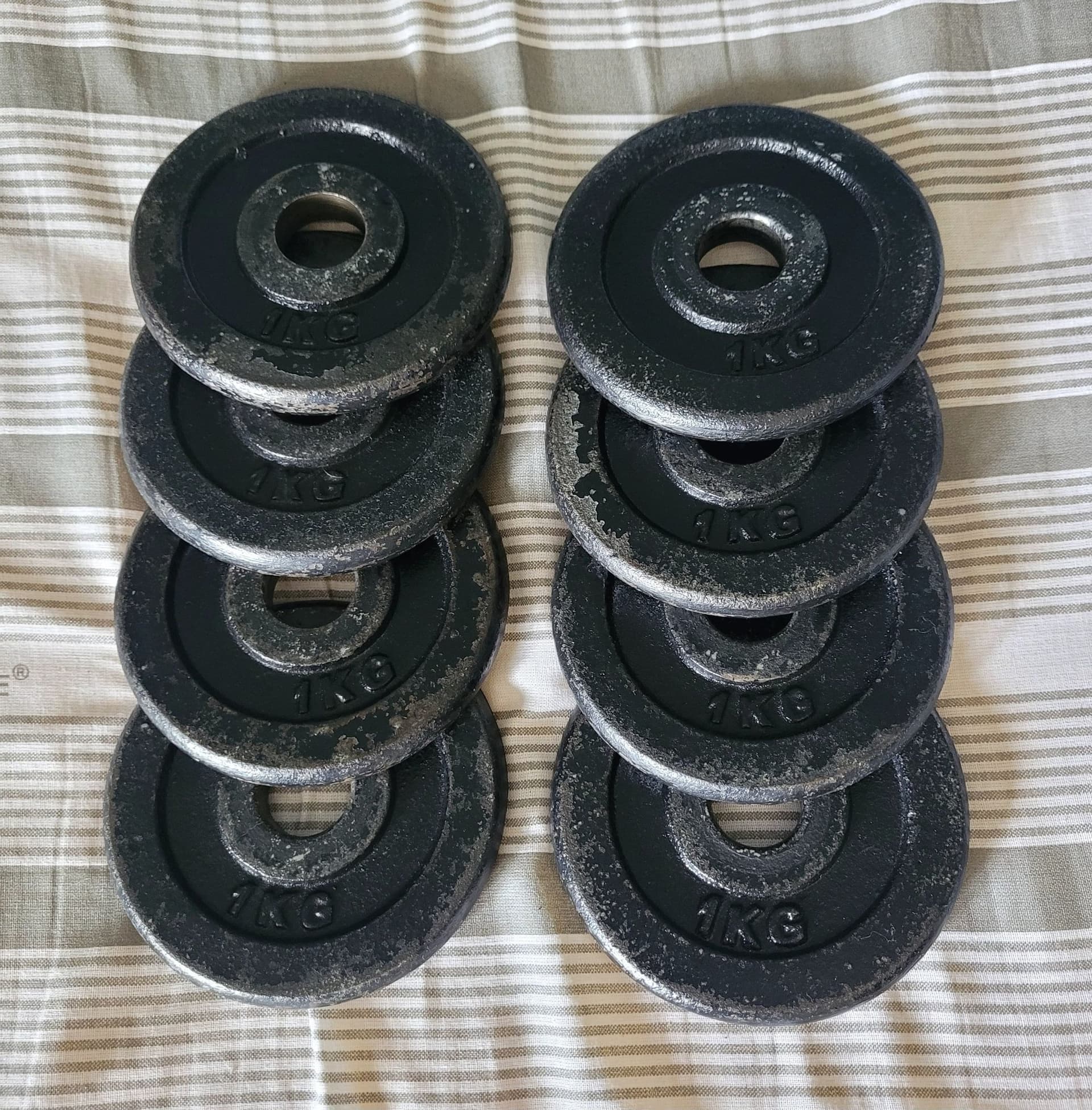 Viktskivor (hd 25mm) – totalvikt 101 kilo + 4 hantelstänger