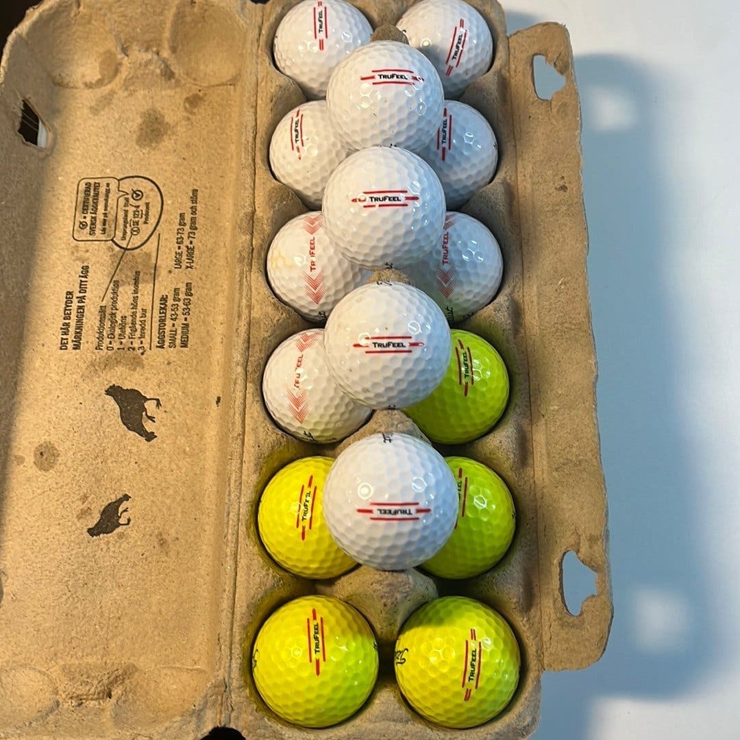 Golfbollar Titleist TruFeel gula vita 16 stycken