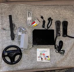 Nintendo Wii konsol med Mario Kart spel och tillbehör