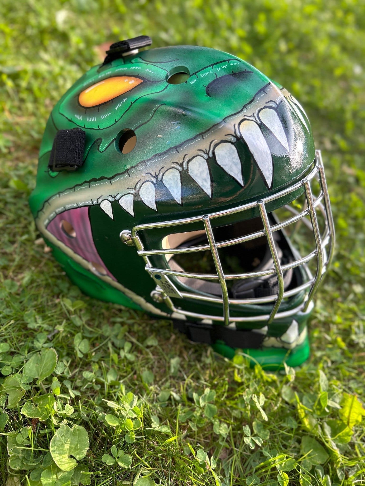 Målvaktshjälm för hockey med dinosauriemotiv