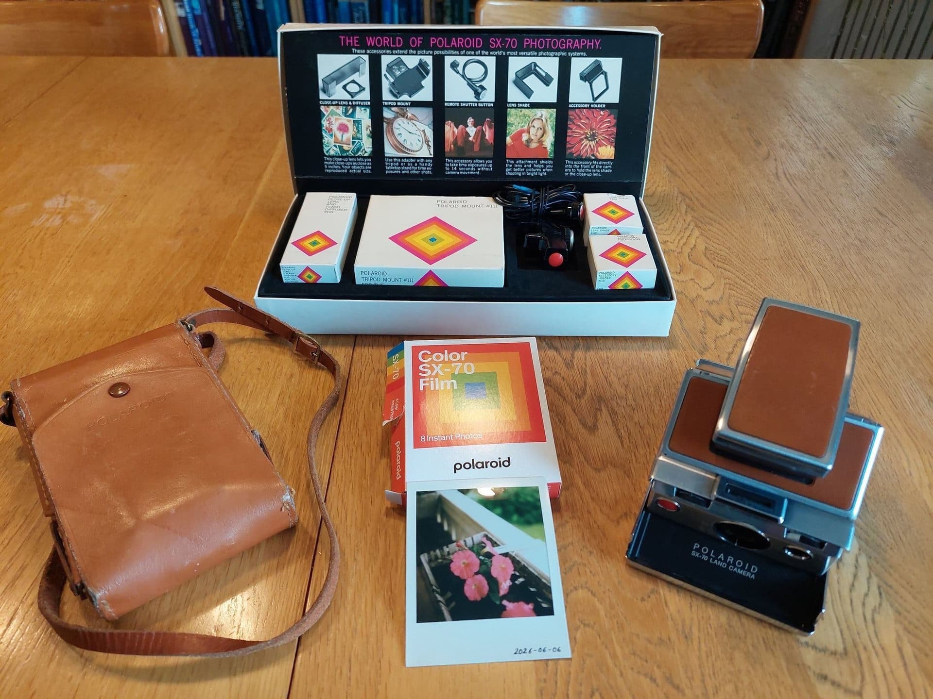 Fantastiskt fin fungerande Polaroid SX-70 Land Camera med tillbehörskit