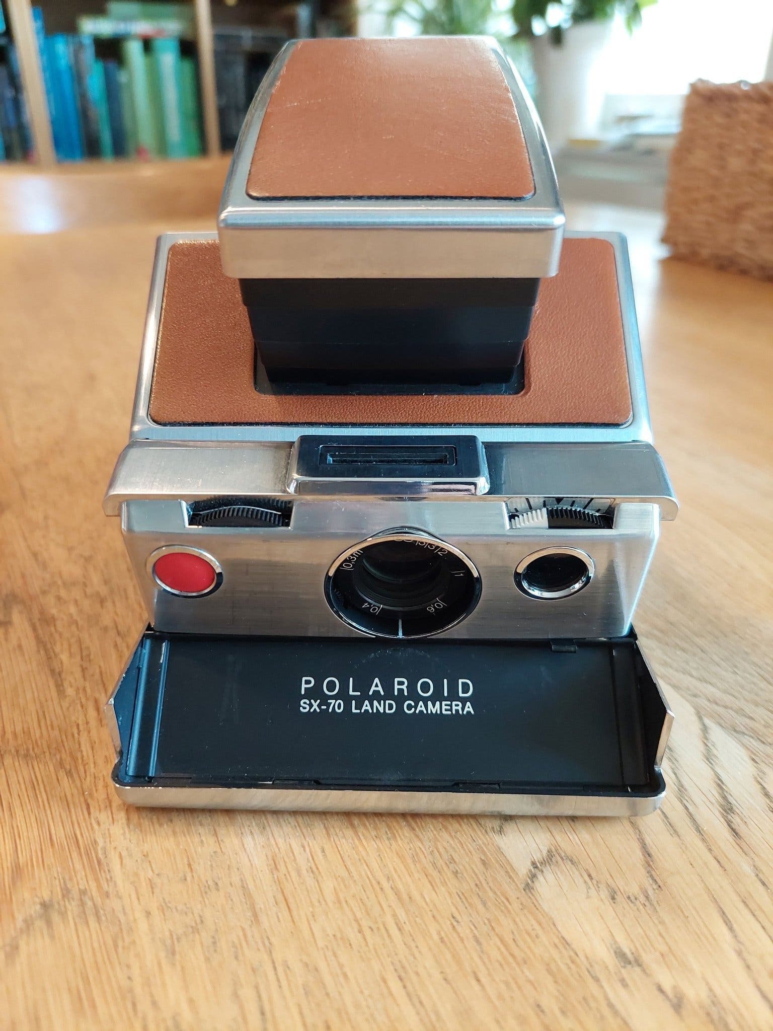 Fantastiskt fin fungerande Polaroid SX-70 Land Camera med tillbehörskit