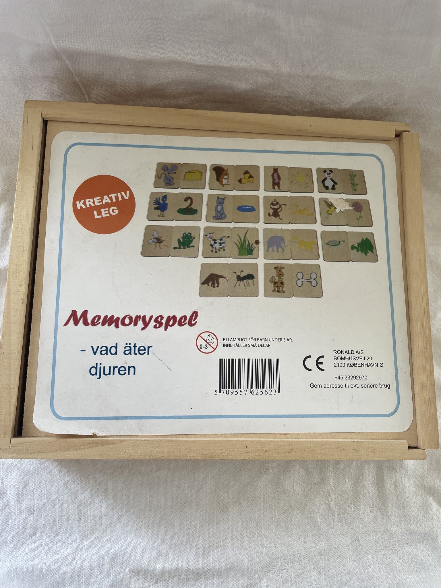 Memoryspel i trä "Vad äter djuren"