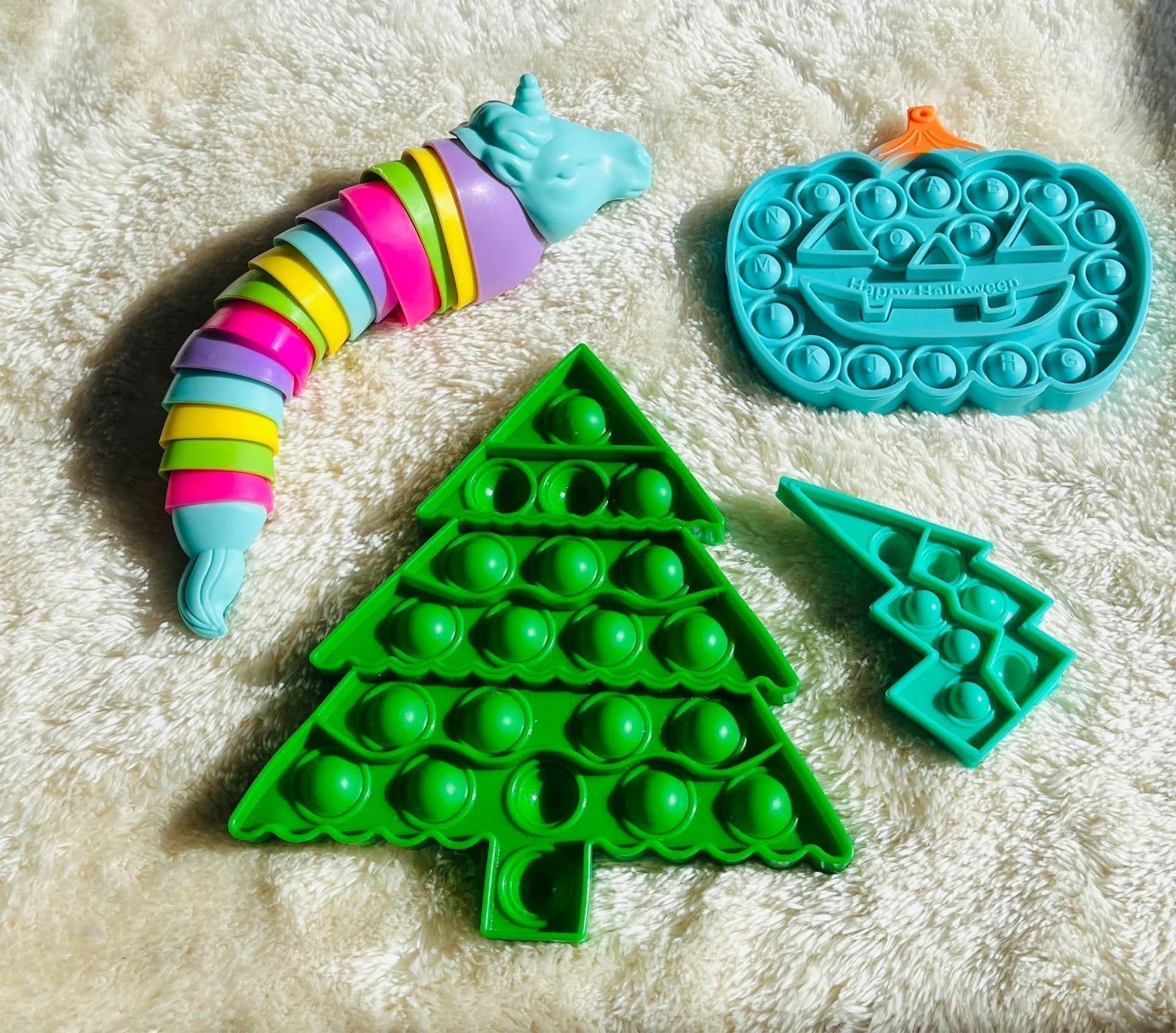 Fidget toys: Unicorn, pumpa, julgran och blixt