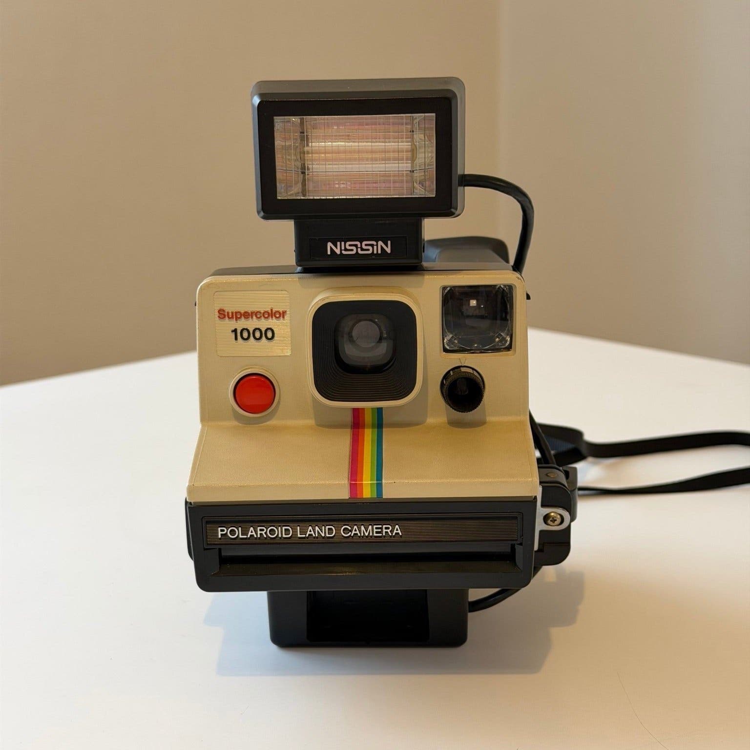 Polaroid Supercolor 1000 Land Camera med Nissin blixt