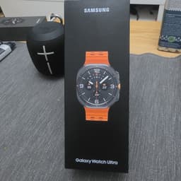 Samsung Galaxy Watch Ultra Smartwatch med Orange Armband