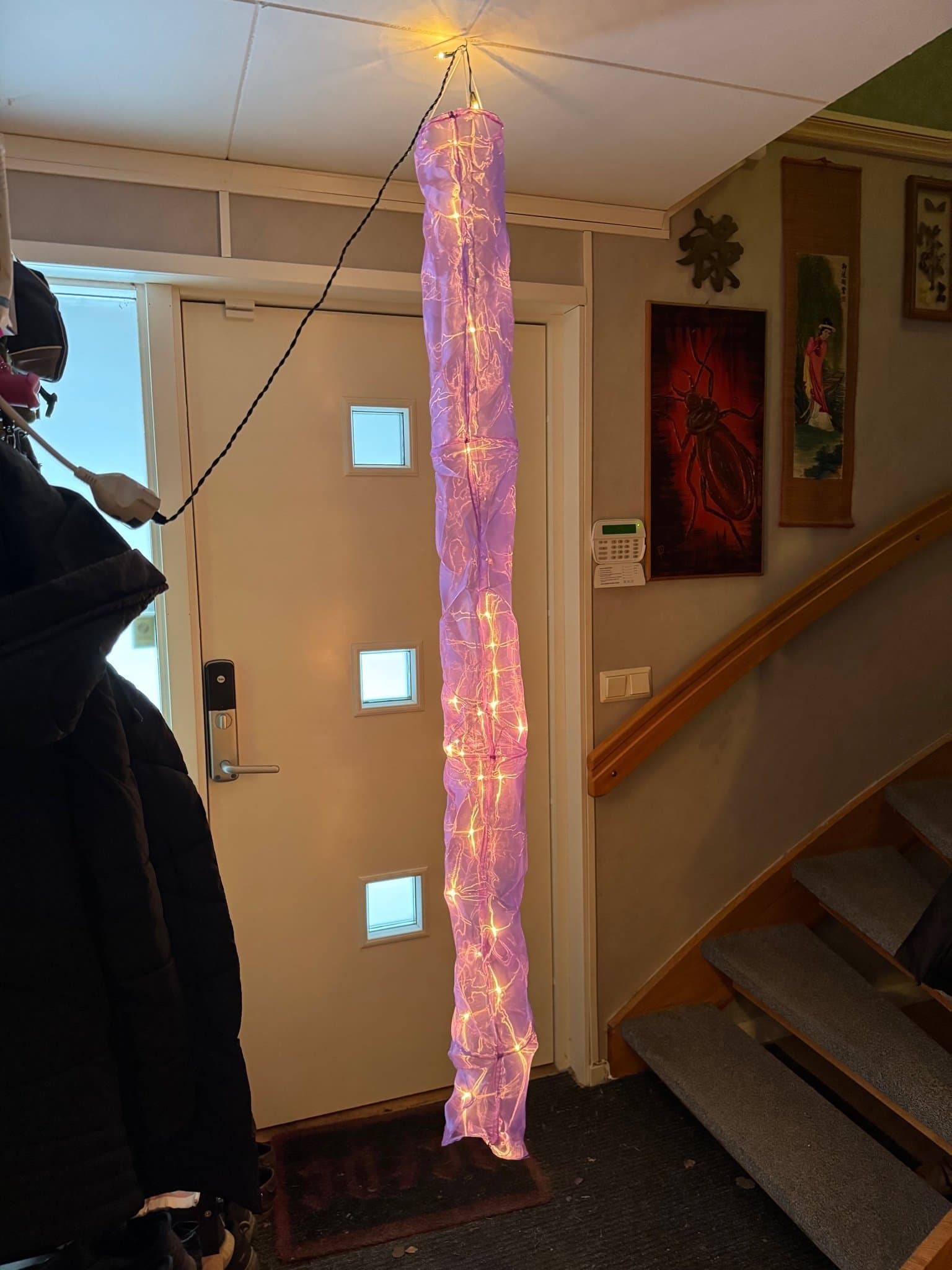 Dekorativ lampa med ljusslinga